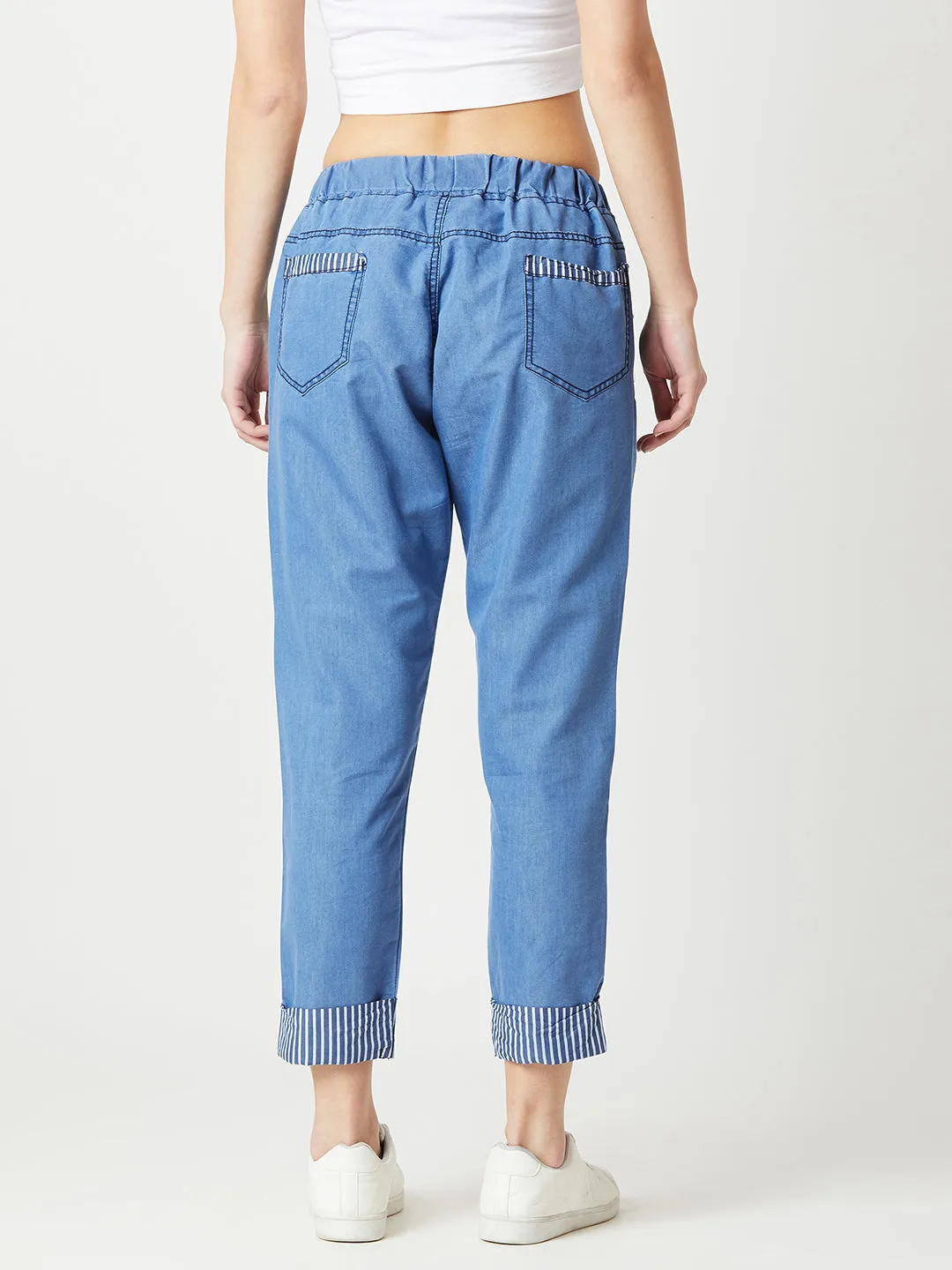 Women's Blue High Rise Clean Look Solid Cropped Striped Detailing Denim Joggers